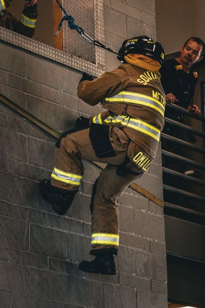 FireFighter O'Malley practicing bail out drills.