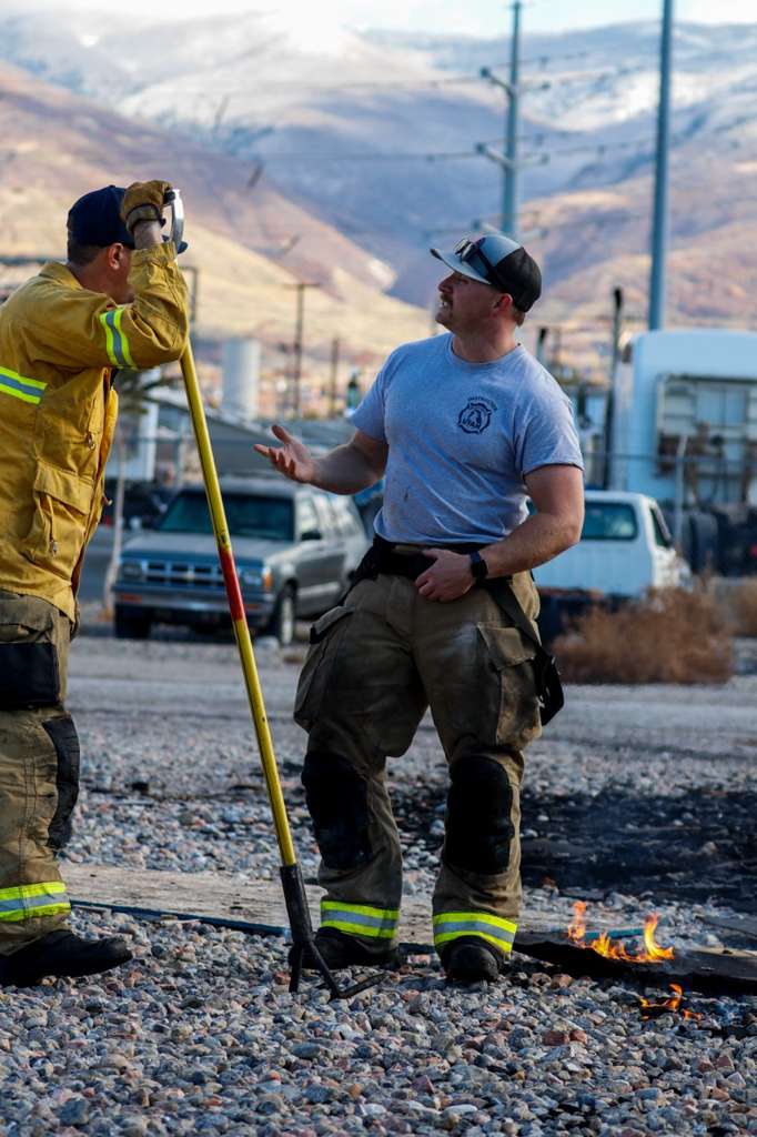 Captain Tebow teaching a firefighting course.